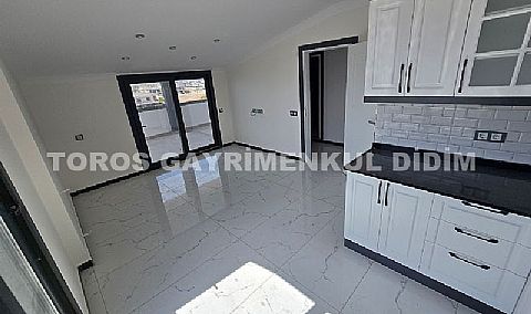 Didim efelerde asansörlü binada satılık 3+1 apartman dubleksi
