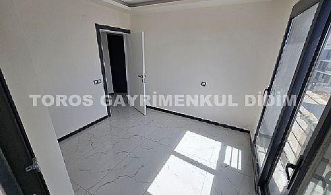 Didim efelerde asansörlü binada satılık 3+1 apartman dubleksi