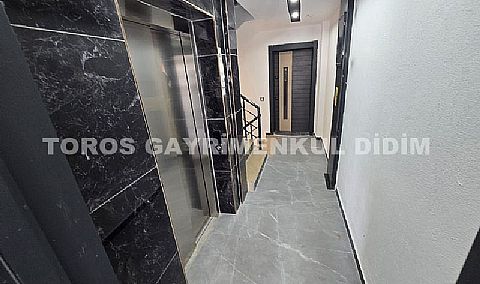 Didim efelerde asansörlü binada satılık 3+1 apartman dubleksi