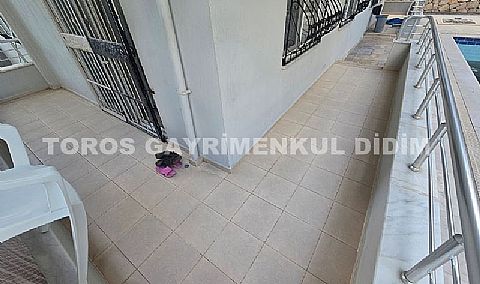 Didim efelerde havuzlu sitede satılık 2+1 eşyalı daire