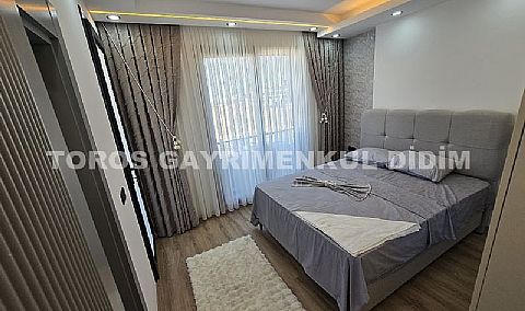 Didim Efeler'de Merkezi Konumda Havuzlu, Sıfır eşyalı Bahçeli 4+1 Tripleks Villa