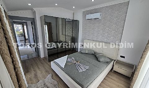 Didim Efeler'de Merkezi Konumda Havuzlu, Sıfır eşyalı Bahçeli 4+1 Tripleks Villa