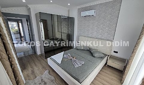 Didim Efeler'de Merkezi Konumda Havuzlu, Sıfır eşyalı Bahçeli 4+1 Tripleks Villa