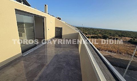 Didim Efeler’de Özel Otoparklı, Doğa ve Kısmen Deniz Manzaralı Sıfır Satılık Dubleks