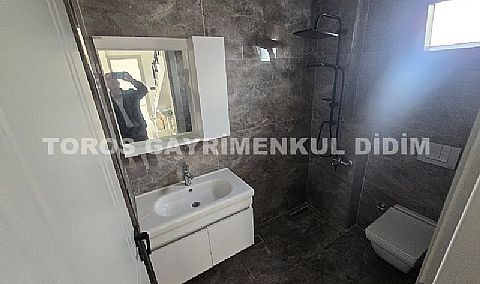 Didim Fevzi paşa mahallesinde plaja 1.200 mt mesafede satılık tam müstakil villa