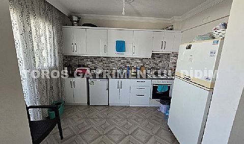 Didim Hisar Mahallesi'nde Yaz-Kış Oturuma Uygun, 95 m² Genişliğinde Kısmi Ayrı Mutfaklı satılık 2+1