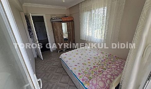 Didim Hisar Mahallesi'nde Yaz-Kış Oturuma Uygun, 95 m² Genişliğinde Kısmi Ayrı Mutfaklı satılık 2+1