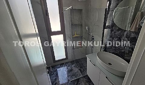 Didim hisarda 500 m2 arsa üzerine kurulu sıfır eşyalı satılık villa