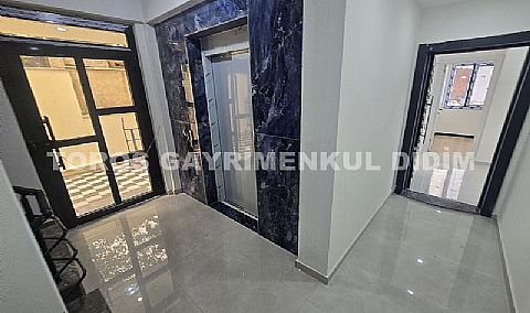 Didim hisarda satılık bahçeli giriş kat ayrı mutfaklı daire