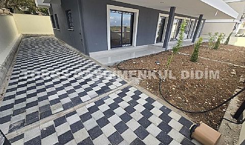 Didim hisarda satılık bahçeli giriş kat ayrı mutfaklı daire