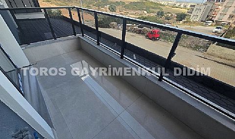 Didim hisarda satılık bahçeli giriş kat ayrı mutfaklı daire