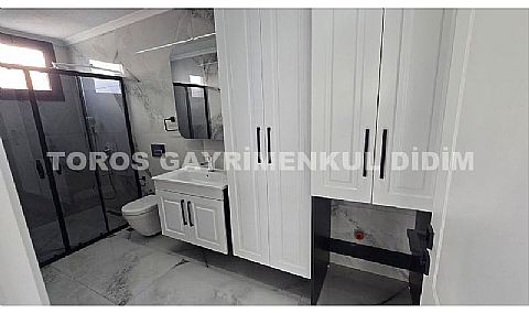 Didim Mavişehir'de Güvenlikli Sitede Havuzlu Tripleks Villa!