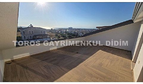 Didim Mavişehir’de , 300  m2  arsa içerisinde,  4+1  deniz  manzaralı  satılık  villa