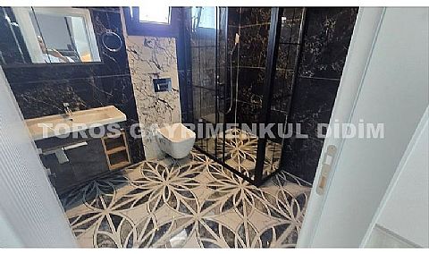 Didim Mavişehir’de plaja 400 mt. mesafede satılık villa