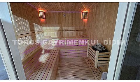 didimde 526m2 arsa içinde satılık full eşyalı saunalı hamamlı havuzlu 4+1 müstakil villa