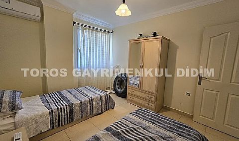 Didimde Havuzlu güvenlikli sitede satılık eşyalı 2+1 yazlık daire