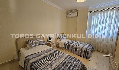 Didimde Havuzlu güvenlikli sitede satılık eşyalı 2+1 yazlık daire