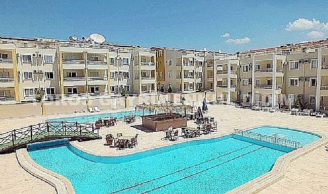 Didimde Havuzlu güvenlikli sitede satılık eşyalı 2+1 yazlık daire