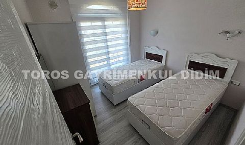 Didim'de Havuzlu Sitede Lüks ve Eşyalı 2+1 Satılık Daire