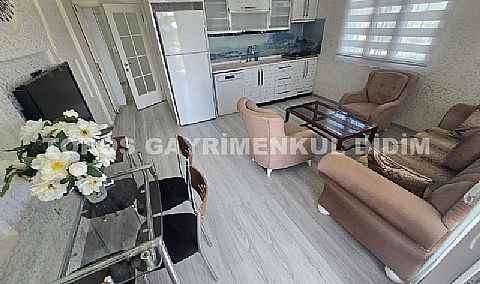 Didim'de Havuzlu Sitede Lüks ve Eşyalı 2+1 Satılık Daire
