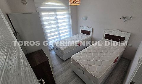 Didim'de Havuzlu Sitede Lüks ve Eşyalı 2+1 Satılık Daire